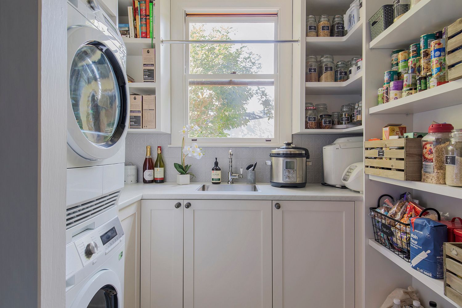 Contemporary home laundry and kitchen save space while creating smart functionality