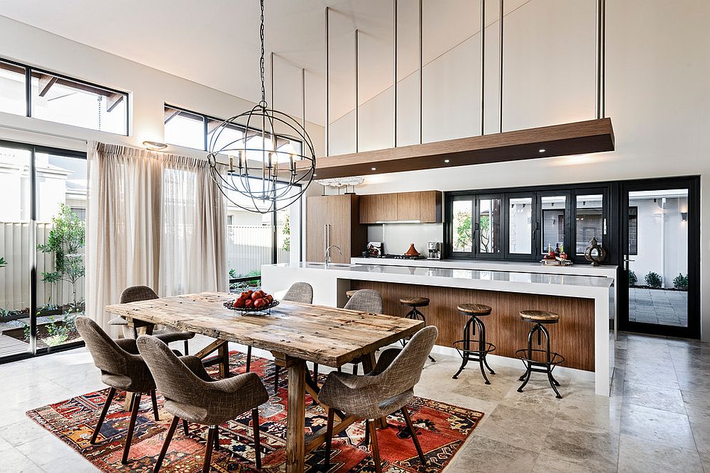 Contemporary kitchen and dining space with industrial and rustic touches thrown into the mix