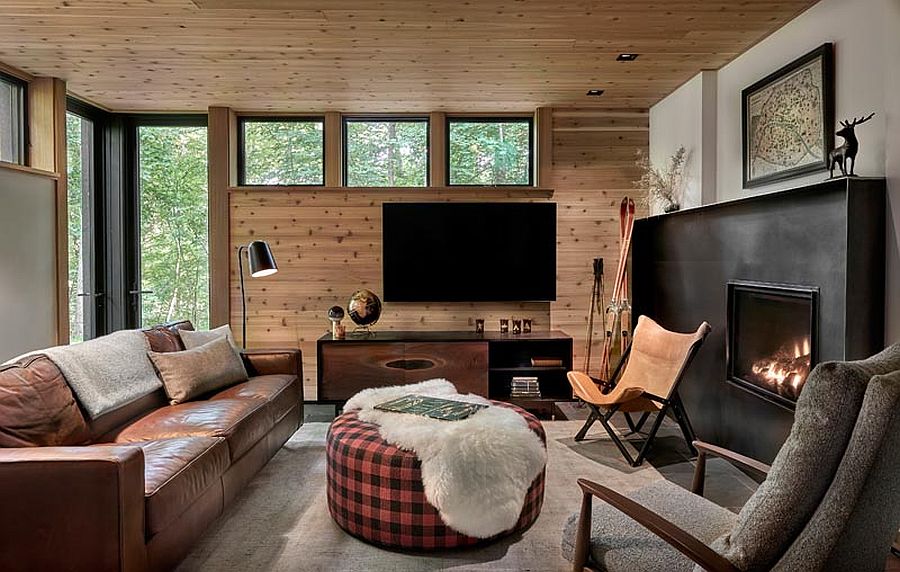Cozy family room of the cabin with fireplace and ample seating