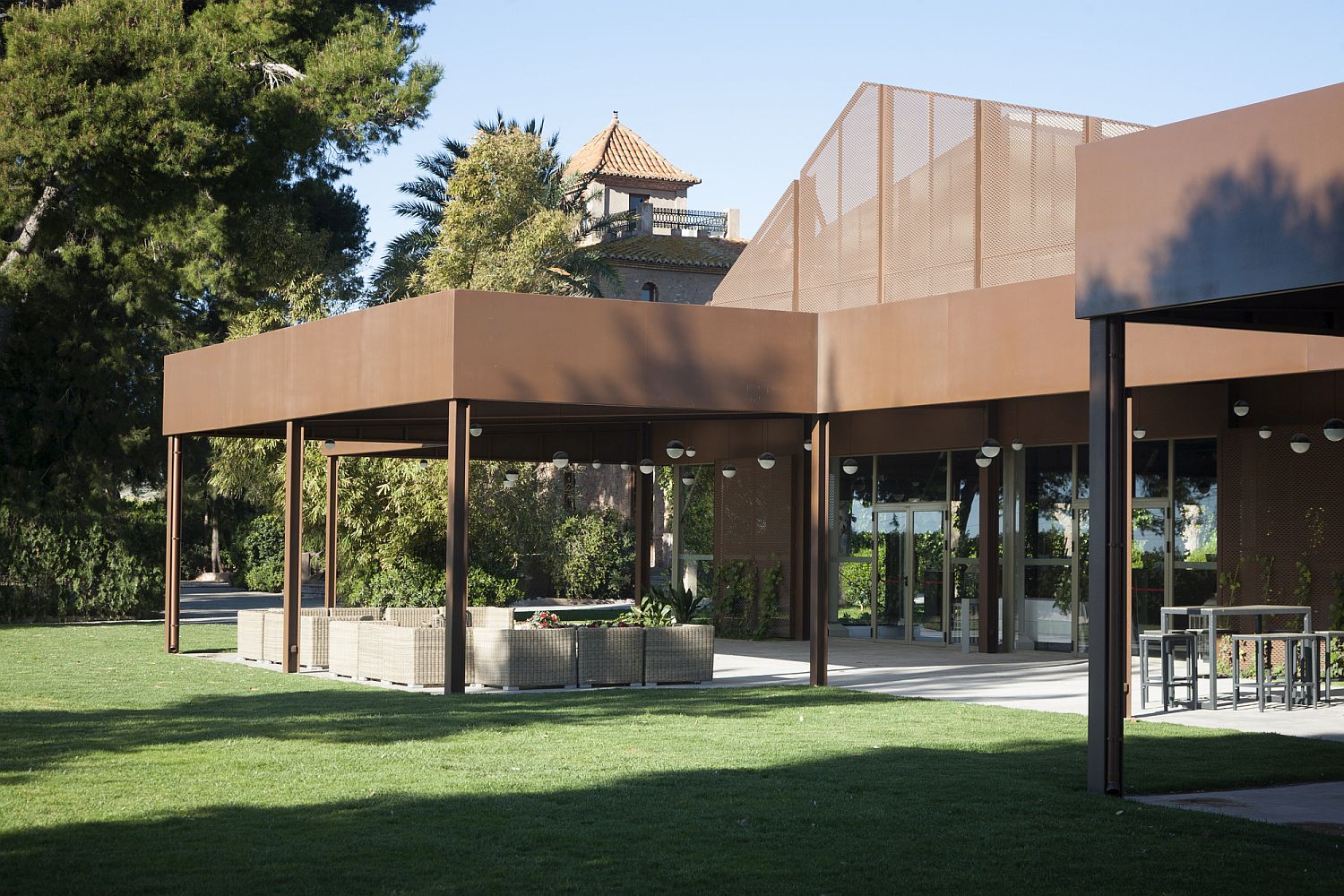 Extensive Corten Steel Structure Brings Outdoor Spaces to Old Spanish Country House