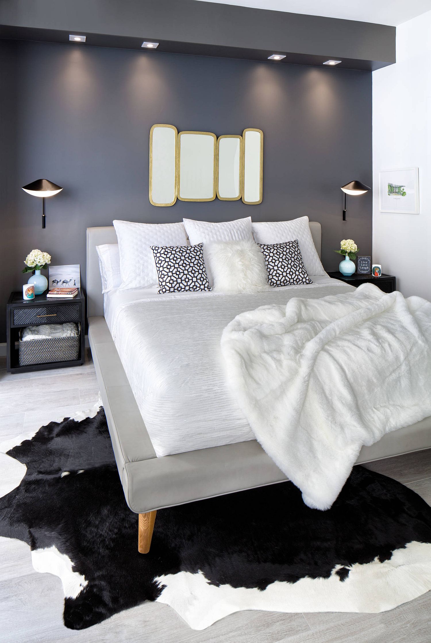 Custom bedroom with space-savvy design and a dark headboard accent wall