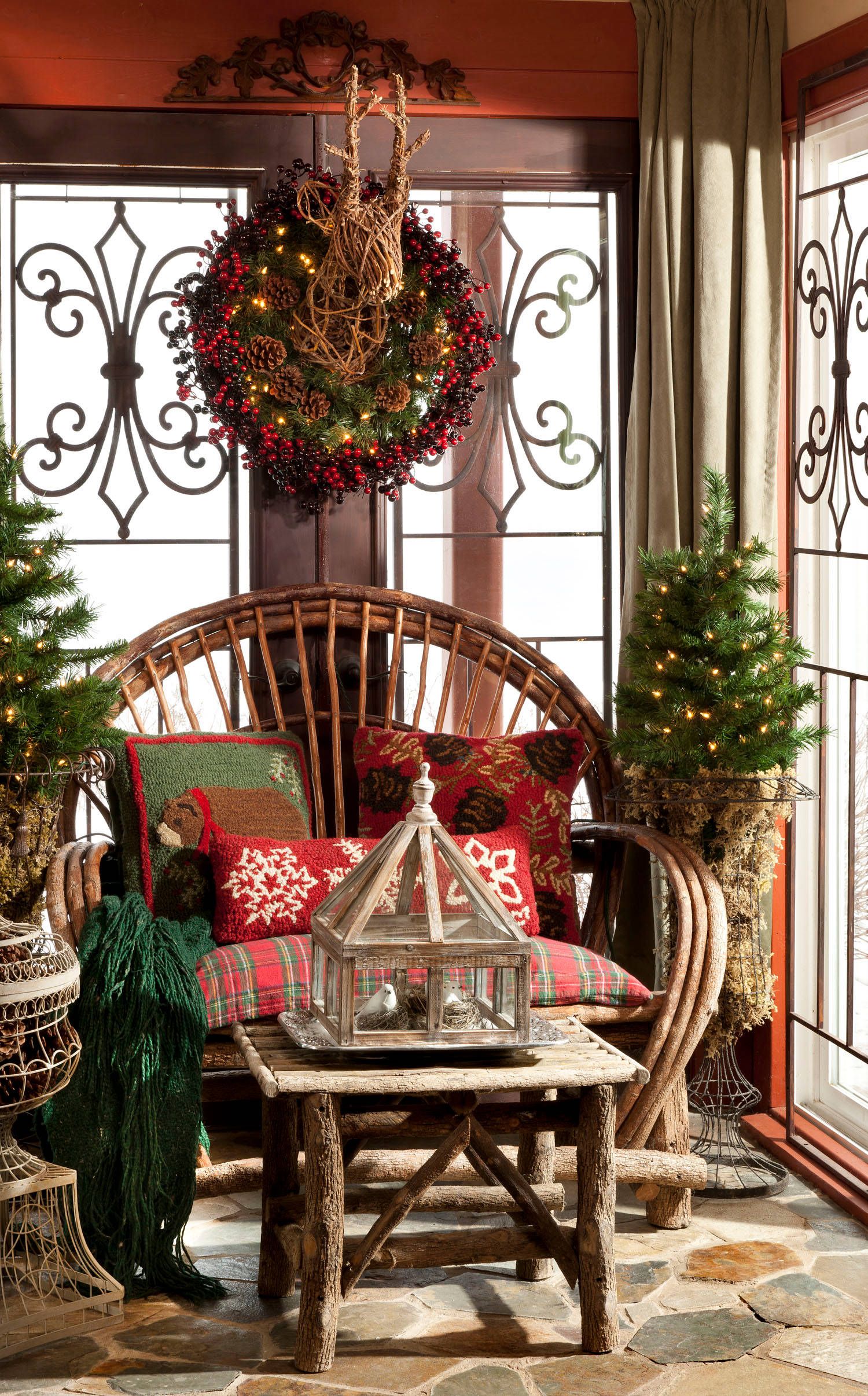 Decorating the covered from porch with rustic style for the Holidays