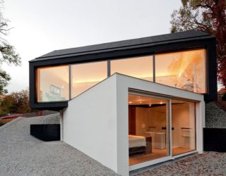 Boxed Brilliance: Black and White Studio House Showcases Twisted Geometry!