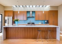 Gorgeous-blue-back-painted-backsplash-for-the-kitchen-with-wooden-cabinets-217x155