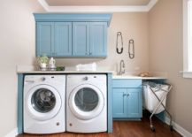 Gorgeous-transitional-laundry-room-in-white-and-blue-with-landry-bag-and-much-more-217x155