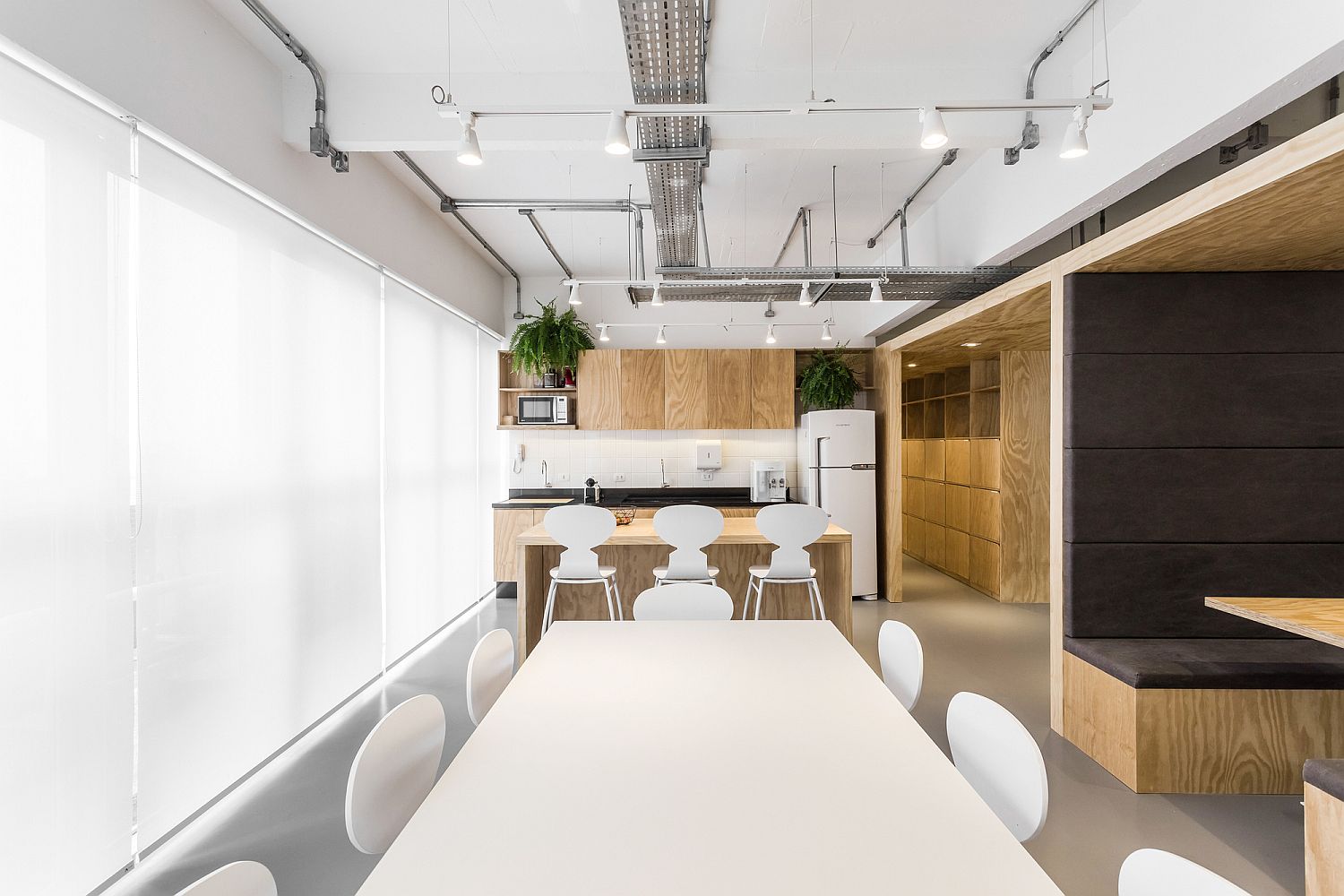 Gorgeous use of gray, white and wood inside the office