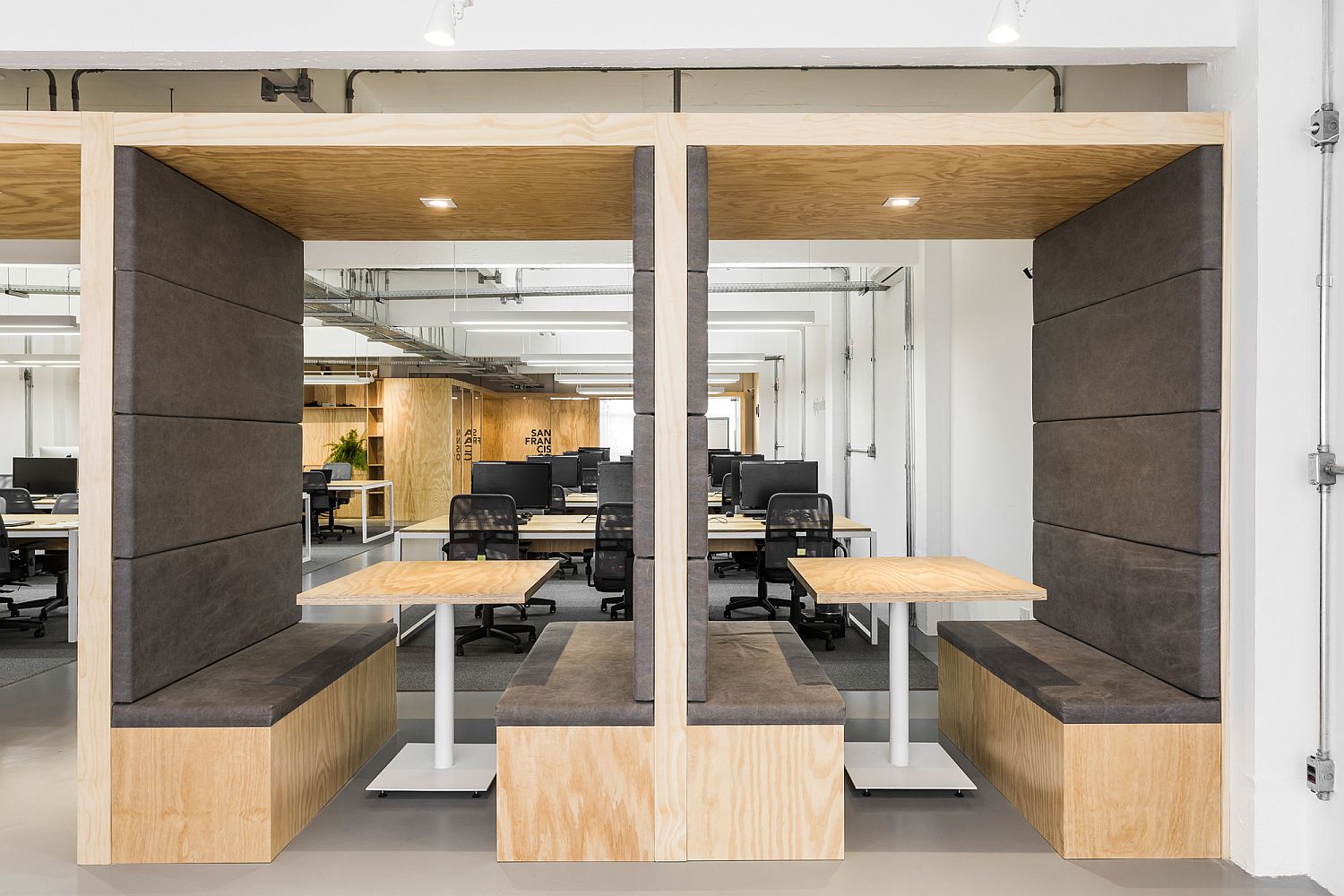 Grey and wood combined beautifully to shape the private sitting spaces