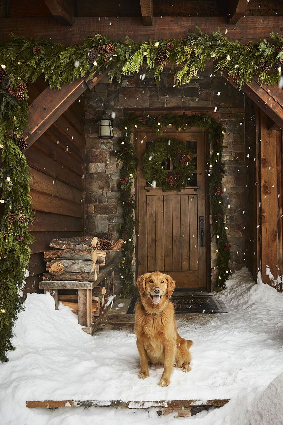 It is garlands and wreaths that bring Chrsitmas magic to this snow-clad home
