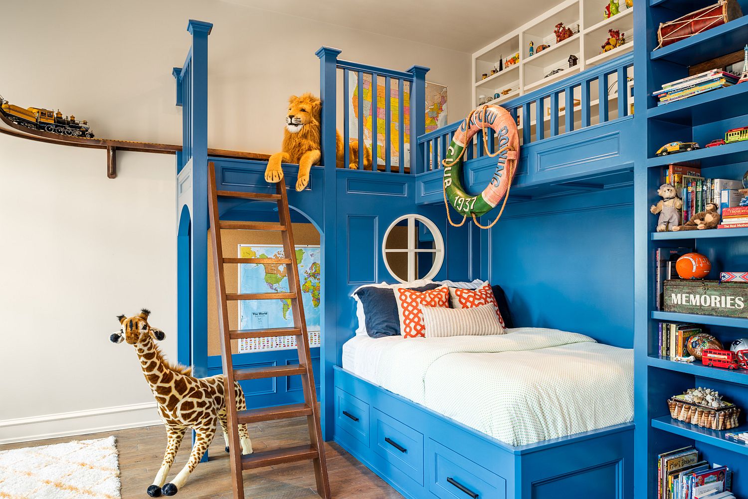 It is the amazing bunk bed with custom shelves steals the show in here