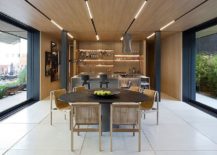 Kitchen-and-dining-area-of-the-modern-Brazilian-prefab-217x155