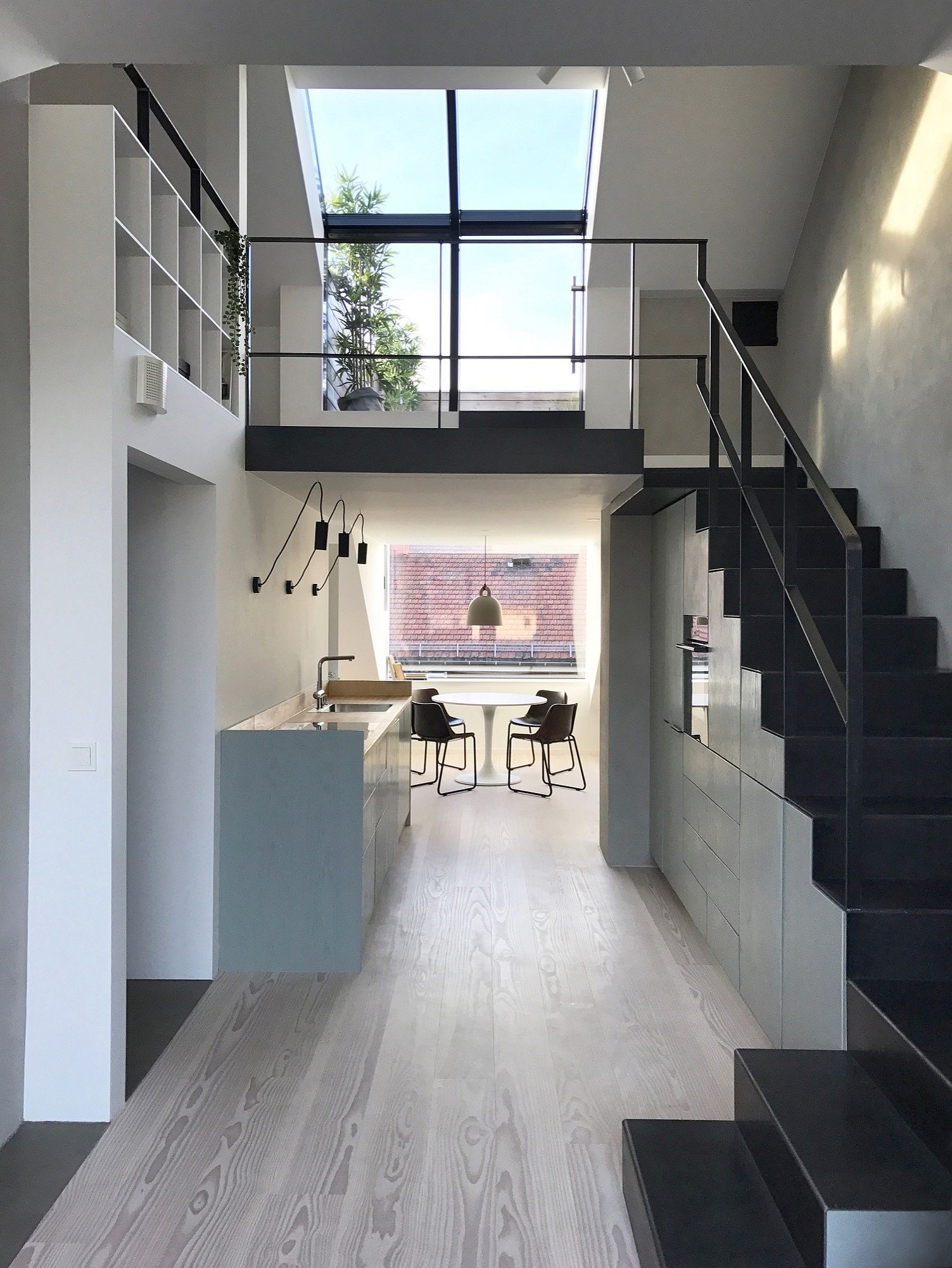 Kitchen, dining area and lving room on the lower level of the apartments