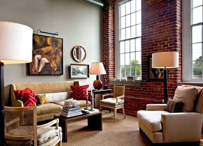 Large-traditional-windows-bring-ample-light-into-the-eclectic-living-room-with-classic-decor-and-brick-walls-650x467.jpg