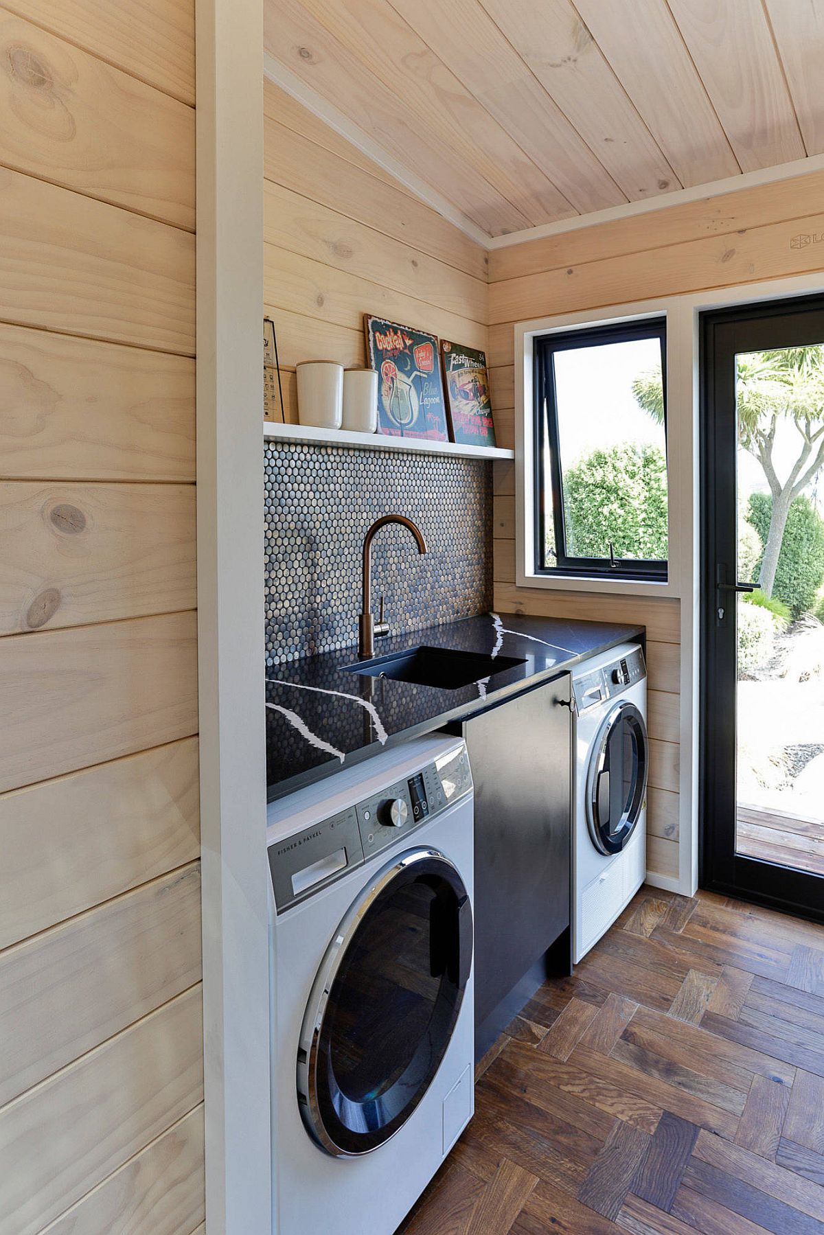 natural finish shiplap on walls of laundry mud room