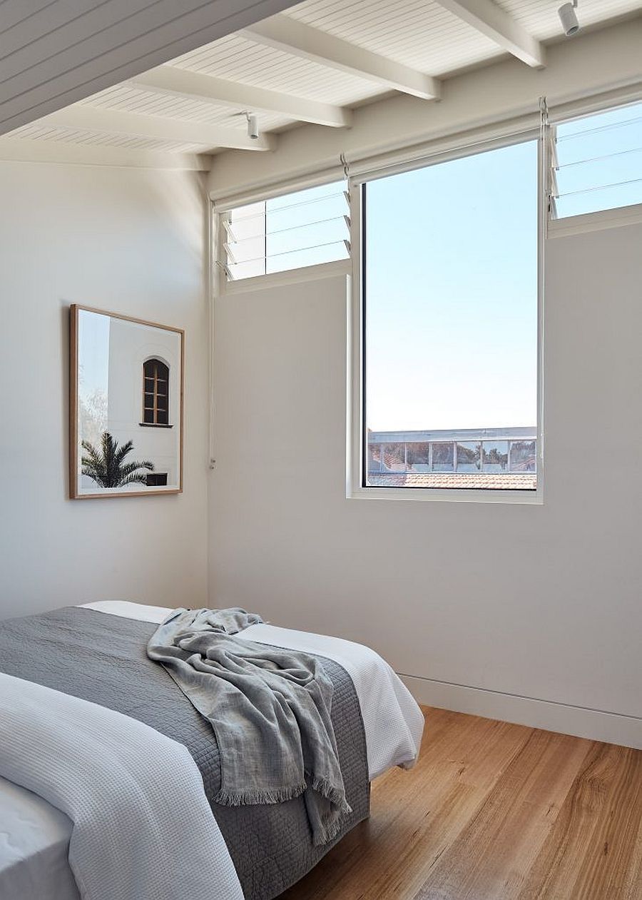 Light flows into the upper level bedroom of the Melbourne house