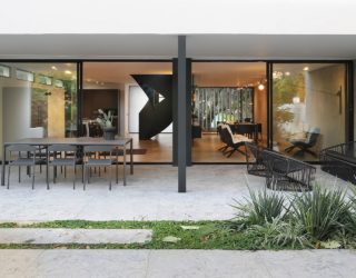 Extensively Renovated 60’s Tel Aviv Home with a Stunning Spiral Staircase in Black