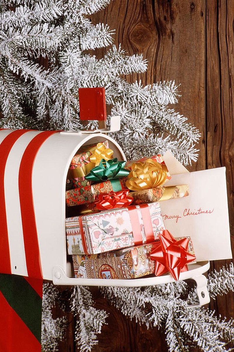 Mailbox filled with gifts and cards on the porche is a fun addition that is a must-try this year!