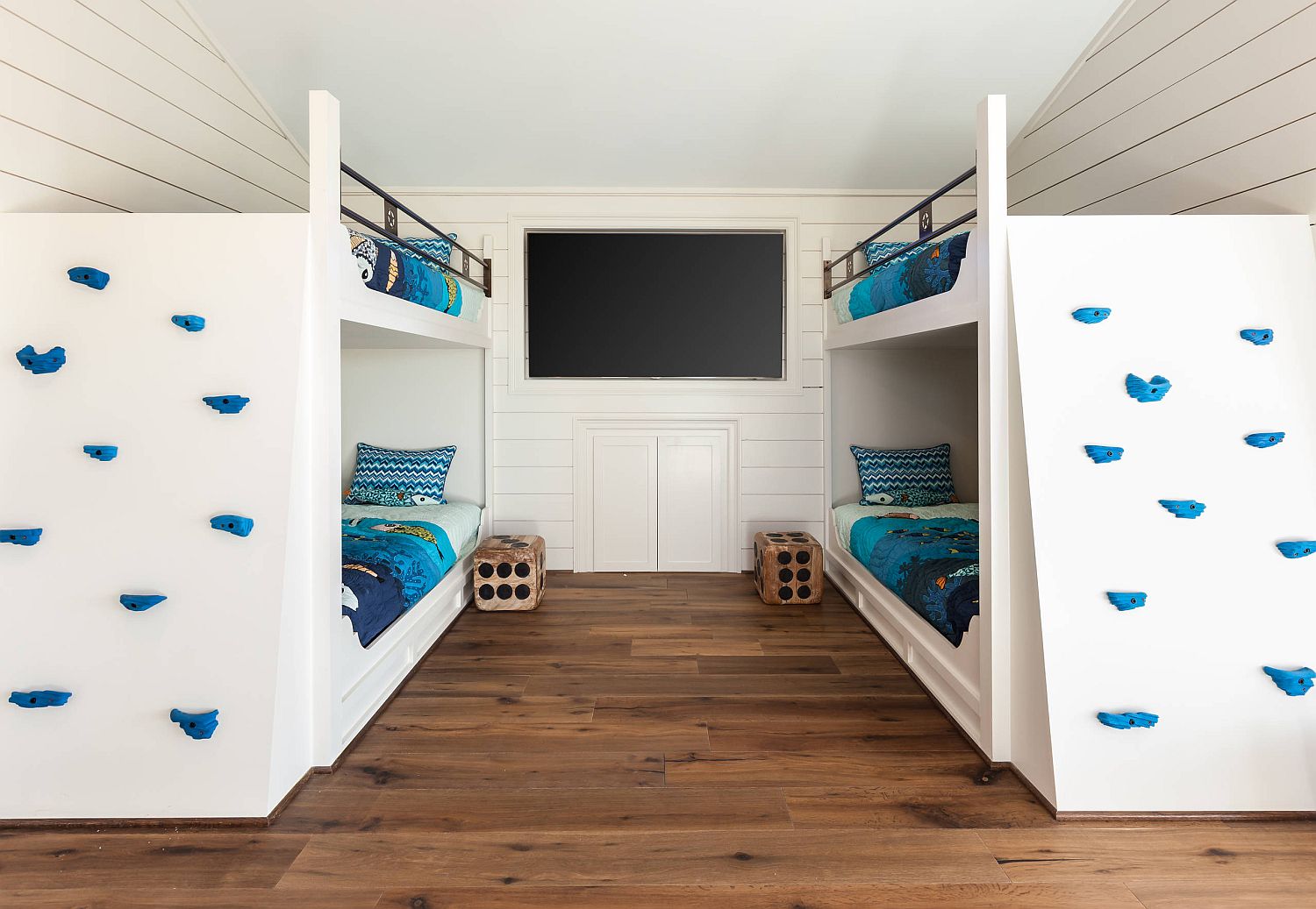 Making the upper level of the bunk beds much more fun with a climbing wall