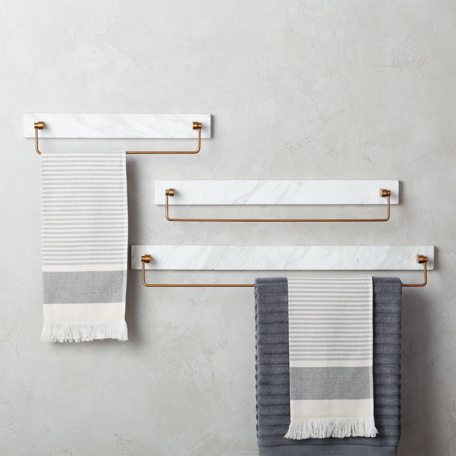 Marble towel bars with gold detailing