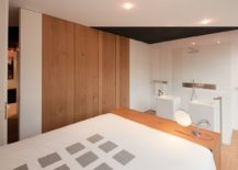 Modern-minimal-master-bedroom-and-bathroom-in-wood-and-white-217x155