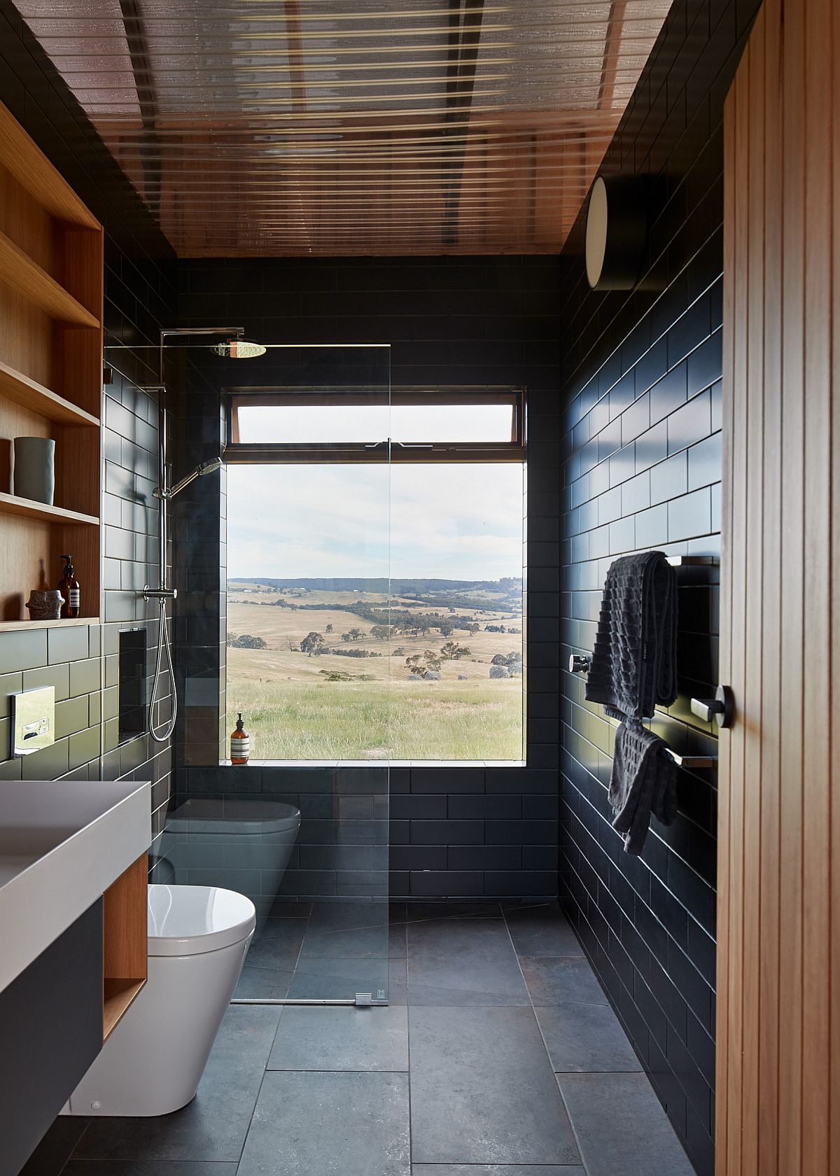 Modern-rustic-bathroom-with-a-touch-of-sophistiation-and-a-woodsy-ceiling