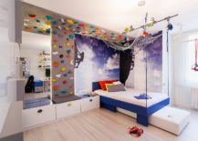 Moving-the-bed-to-the-corner-frees-up-space-in-the-modern-kids-bedroom-with-climbing-wall-217x155