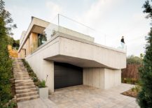 Multi-level-Spanish-home-in-concrete-wood-and-glass-with-a-sheltered-entrance-217x155