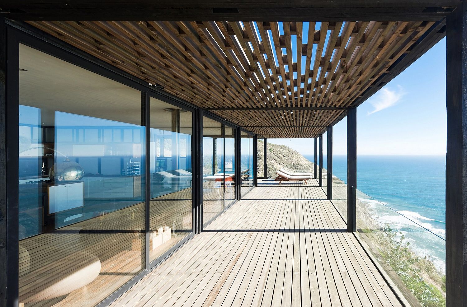 Open deck outside the house offers amazing views of the coastline