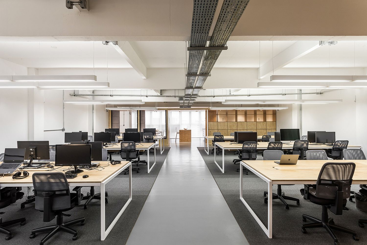 Open, spacious and well-lit working areas of the modern industrial office in brazil