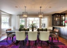 Patchwork-pattern-rug-in-pink-and-purple-is-the-real-showstopper-in-this-dining-room-217x155