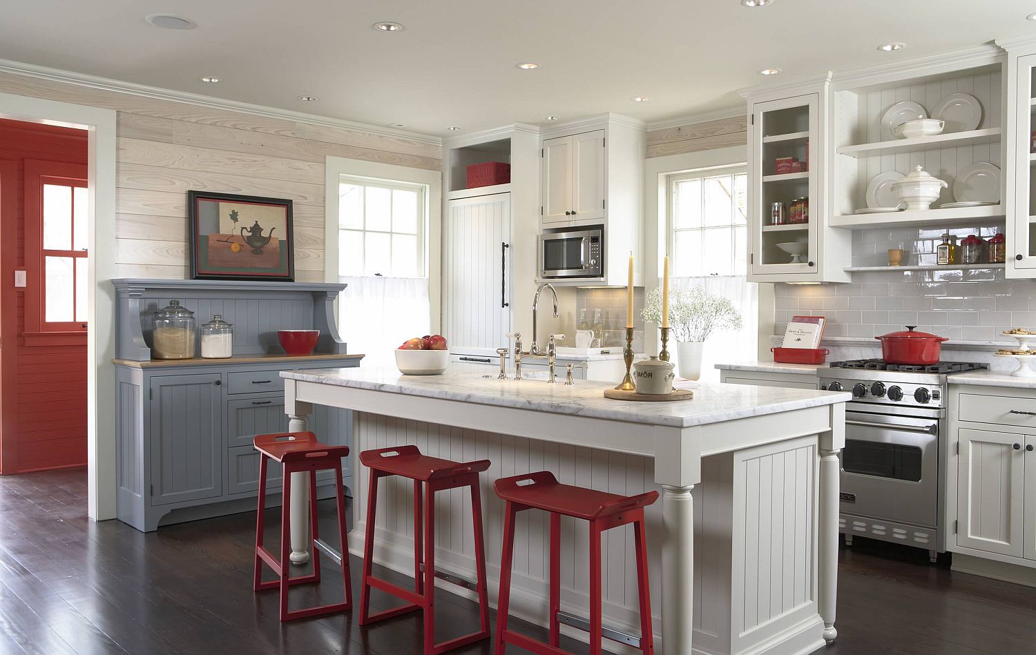 Pops-of-red-enliven-the-traditional-cottage-style-kitchen-in-white-and-gray