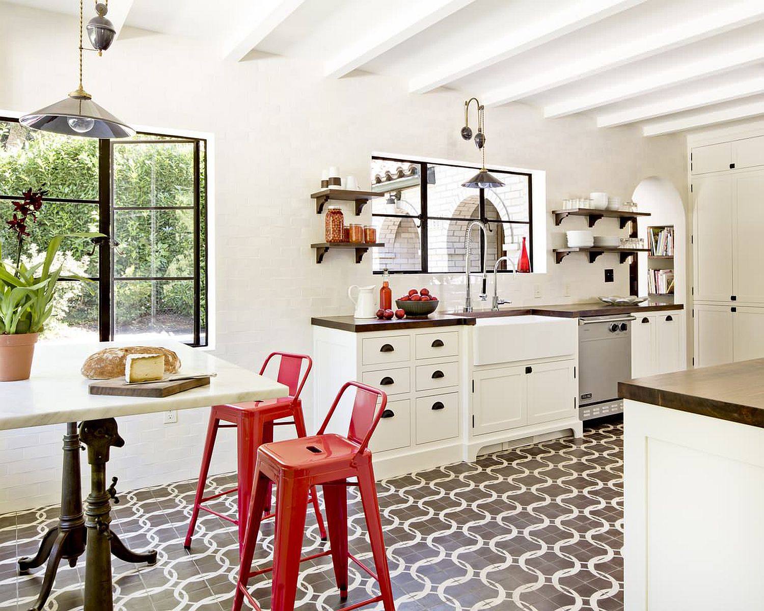 Red-bar-chairs-bring-brightness-to-the-small-and-stylish-Mediterranean-kitchen-in-white-with-lovely-floor-tiles