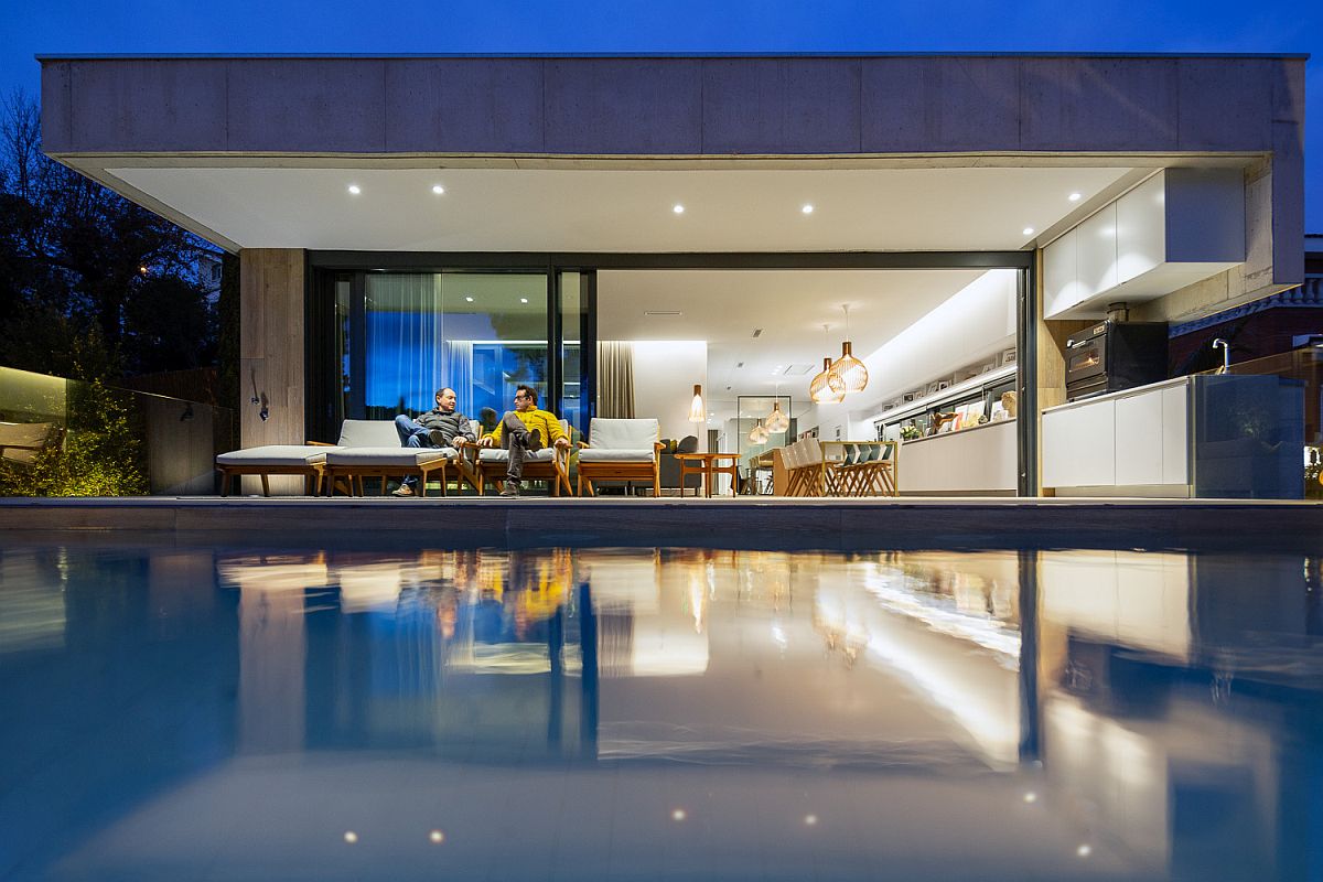 Reflection of the home and the landscape in the pool