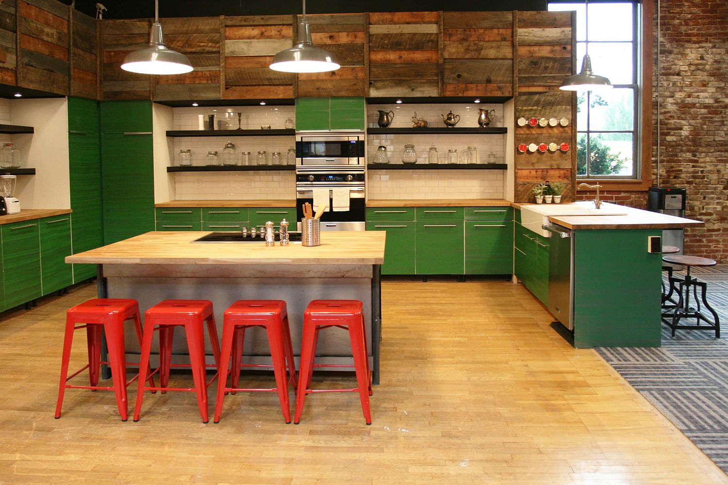 Simple backless industrial bar stools in red are perfect for kitchen with matching industrial charm