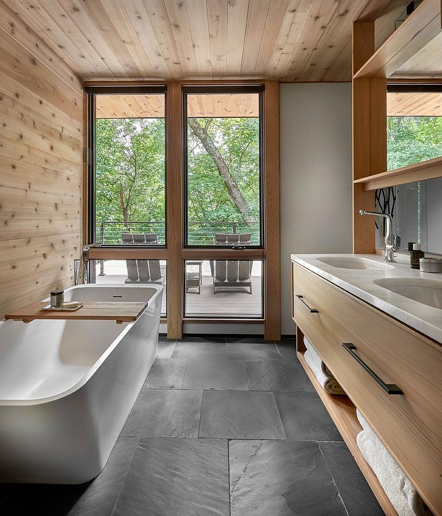 Slate on the floor makes a big visual impact in this contemporary bathroom