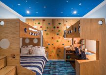 Small-and-space-savvy-kids-bedroom-design-with-blue-ceiling-bunk-beds-and-climbing-wall-217x155