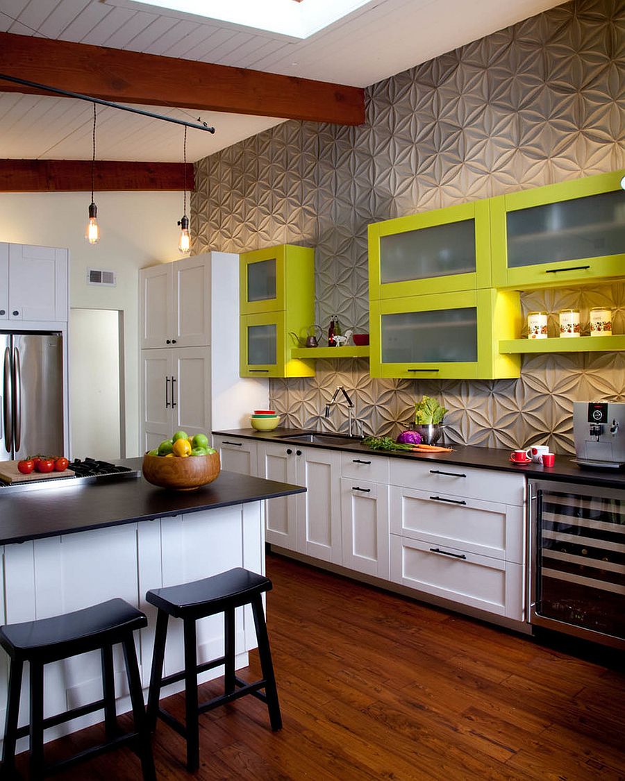 Spacious kitchen with 3d-tiled backsplash and cabinets that bring a dash of yellow