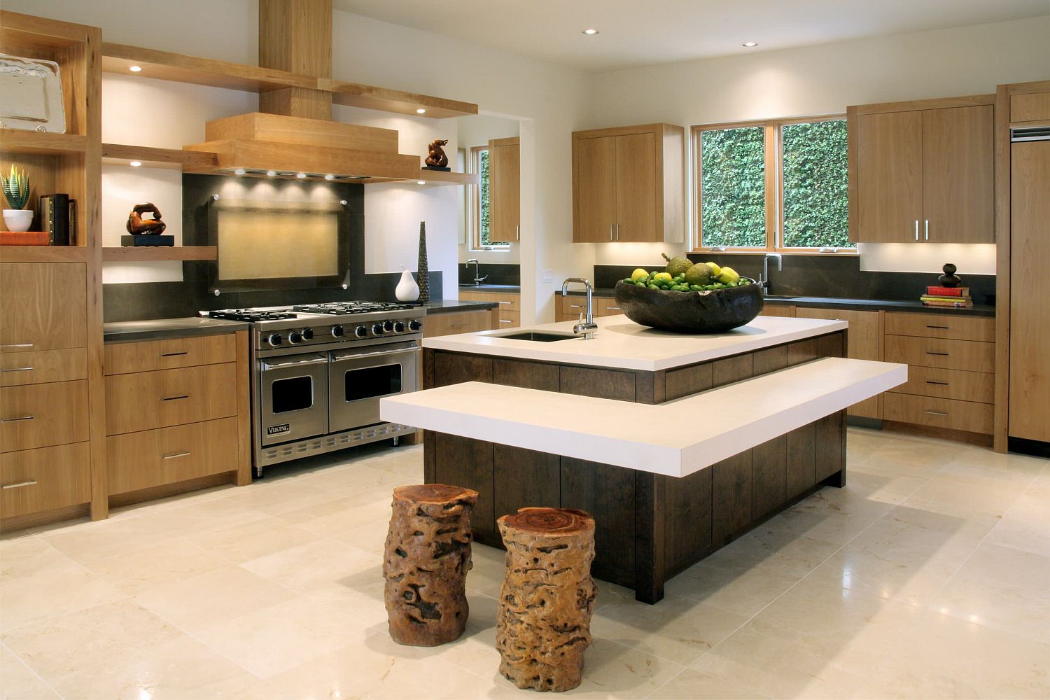 Tree stumps turned into dashing bar stools in the contemporary kitchen