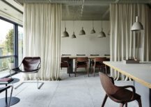 Using-drapes-and-curtains-to-delineate-space-inside-the-office-217x155