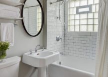 Victorian-style-bathroom-with-vintage-touches-maximizes-space-by-using-a-gray-backdrop-217x155