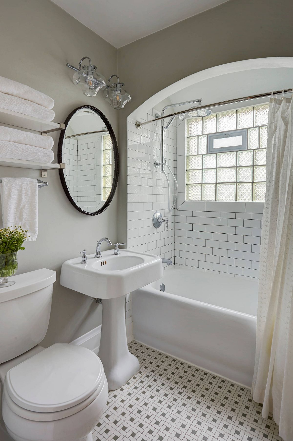 Victorian style bathroom with vintage touches maximizes space by using a gray backdrop