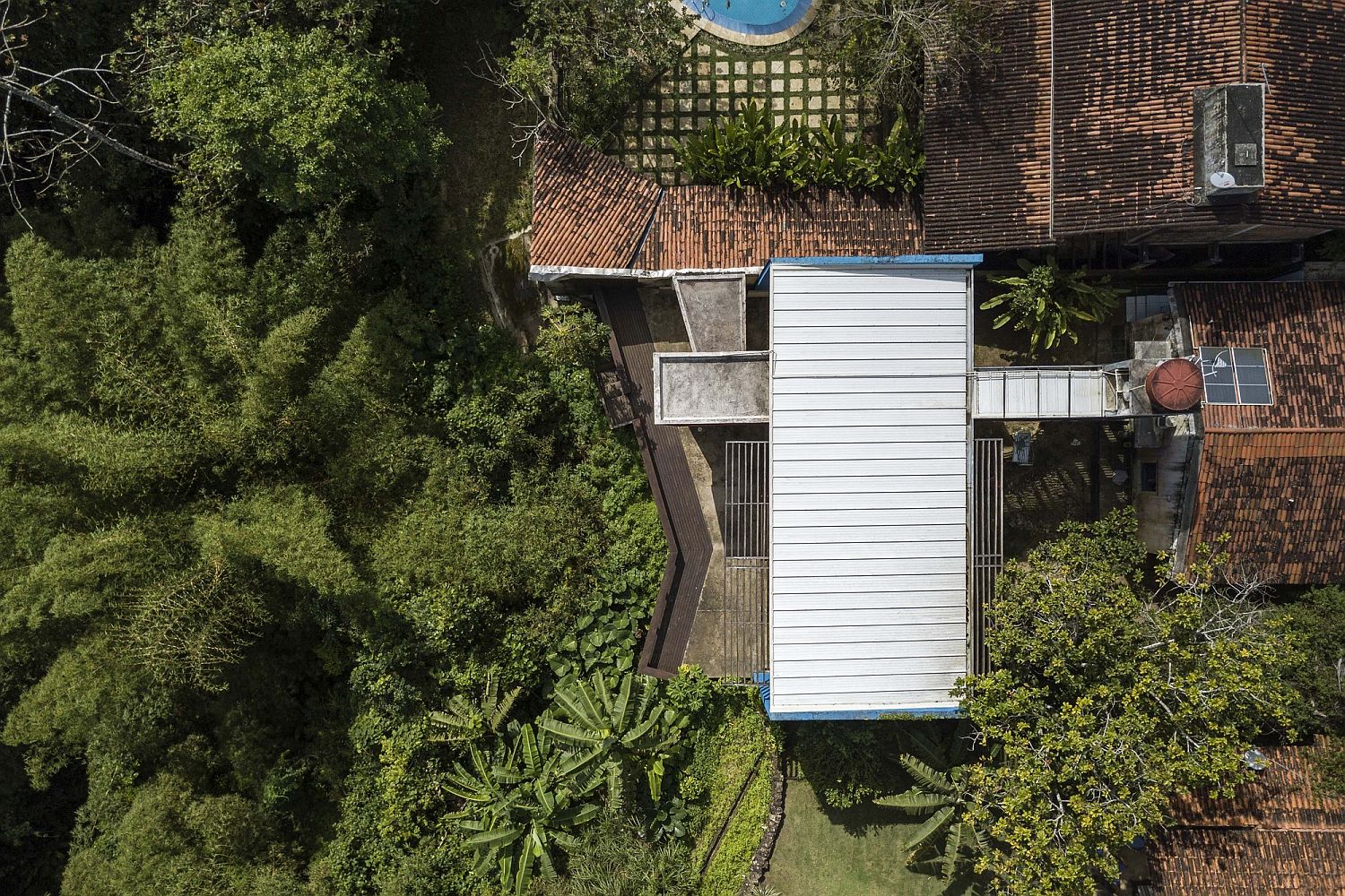 View from the sky of the extended modern house in Brazils surrounded by jungles