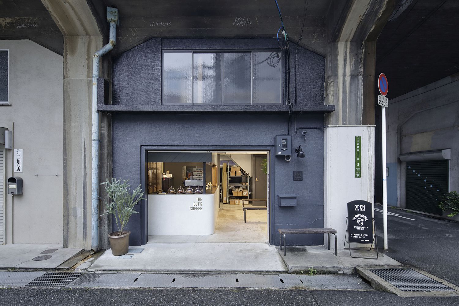 View-from-the-street-of-the-gorgeous-modern-coffee-shop-inside-revamped-industrial-warehouse