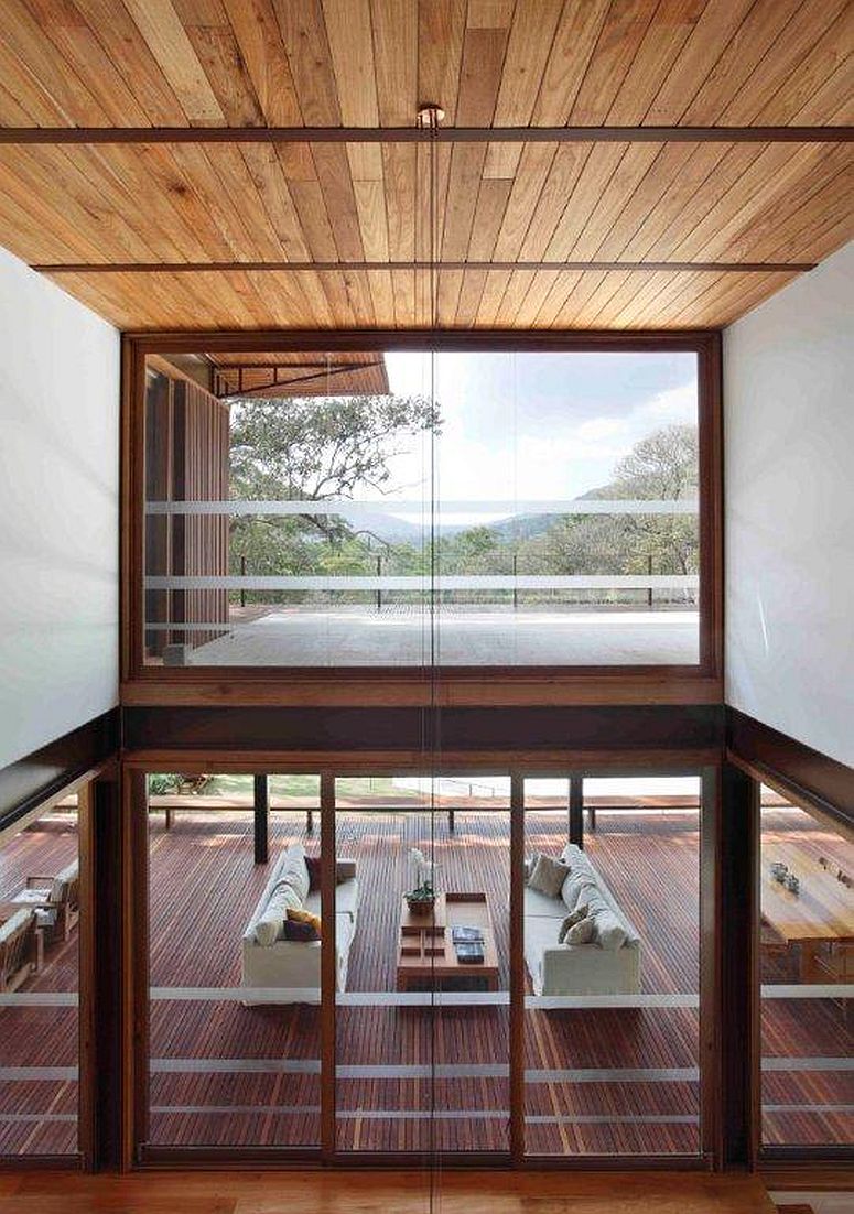 View of the deck and the landscape from the upper level of the house