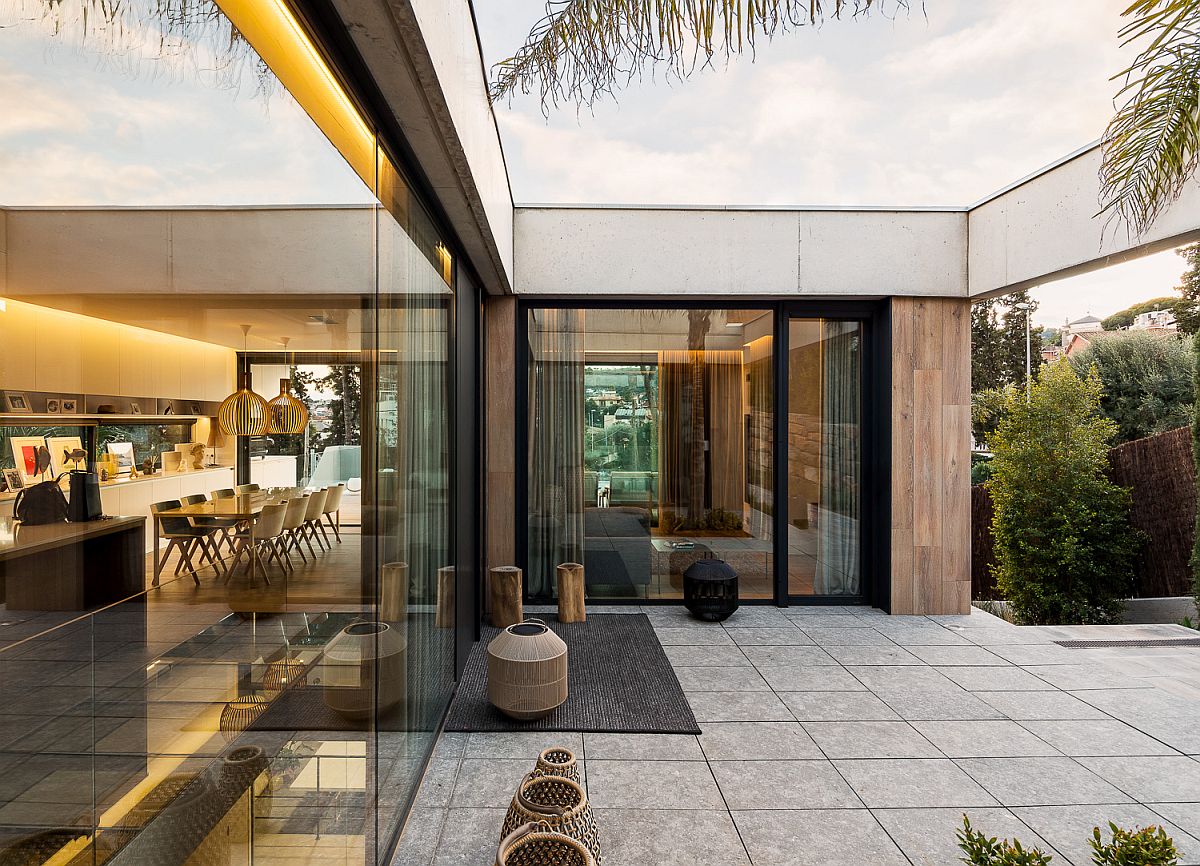 View of the living area, dining room and kitchen from the porch and outdoor sitting area