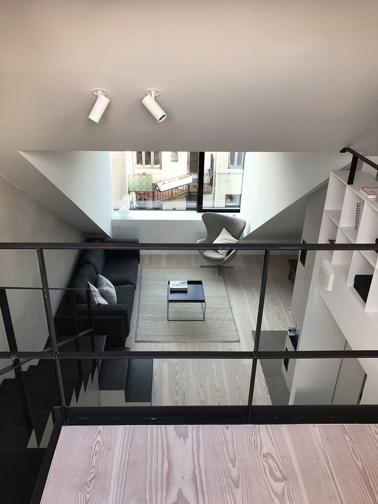 View of the living area from the upper level of the apartments