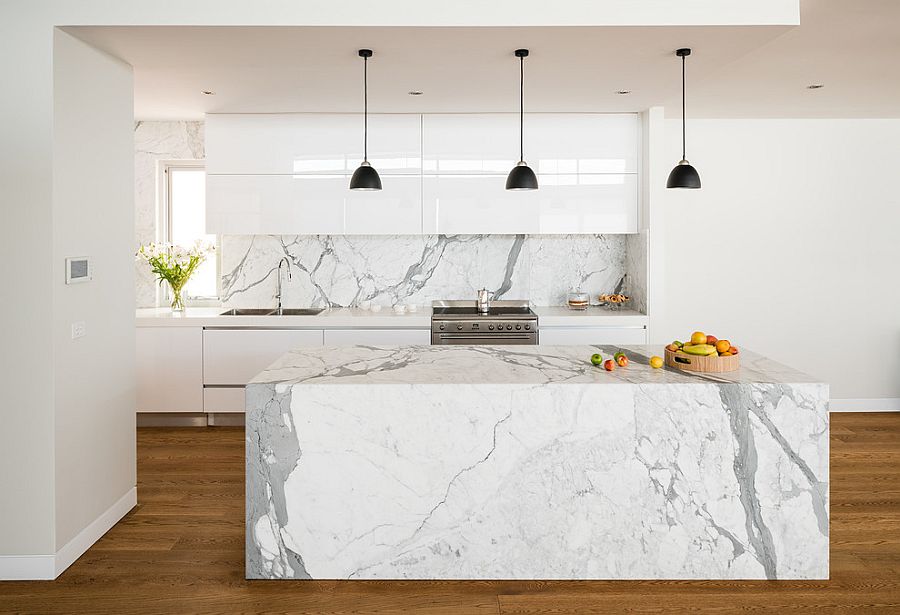 White and marble modern kitchen with dark pendant lights