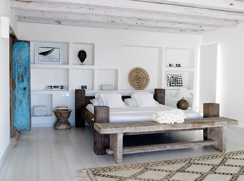Whitewashed-ceiling-beams-blend-into-the-white-backdrop-of-the-bedroom-with-ease
