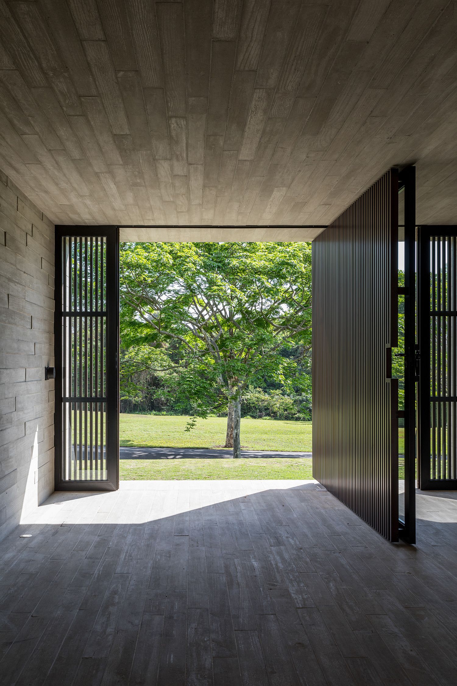 Wood and metal interior of the modern home in Brazil