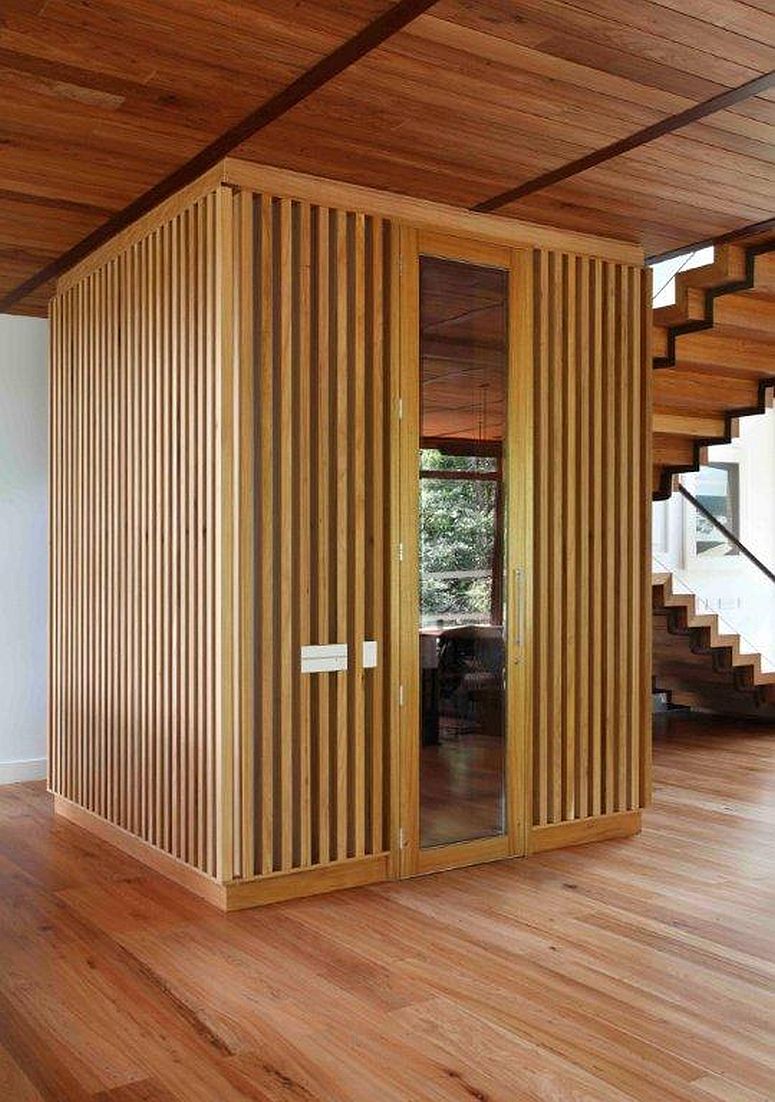 Wooden-structure-creates-a-room-within-a-room-inside-the-spacious-Brazilian-house