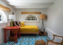 Yellow-and-blue-accents-for-the-ultra-tiny-modern-bedroom-in-white-217x155